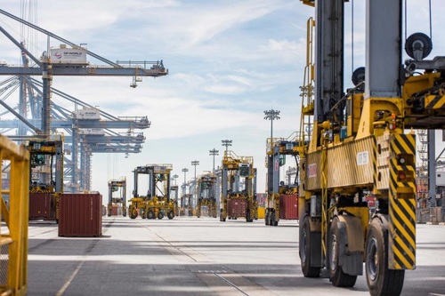 Straddle machinery at DP World port.