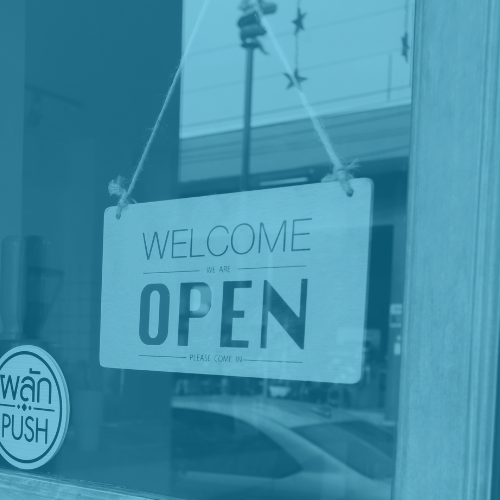 We are open sign in a shop window.