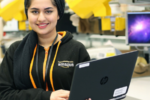 Woman holding a laptop